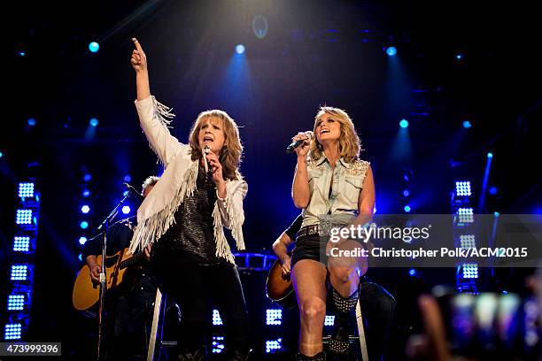 Singers Patty Loveless and Miranda Lambert perform onstage at the ACM Presents: Superstar Duets at Globe Life Park in Arlington on April 18, 2015 in...