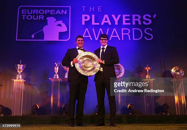 Brooks Koepka of the USA receives the Rookie of the Year award from Peter Uihlein of the USA during the European Tour Players' Awards ahead of the...