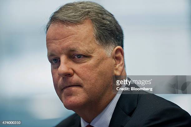 William Douglas "Doug" Parker, chairman and chief executive officer of American Airlines Group Inc., listens during an interview in New York, U.S.,...
