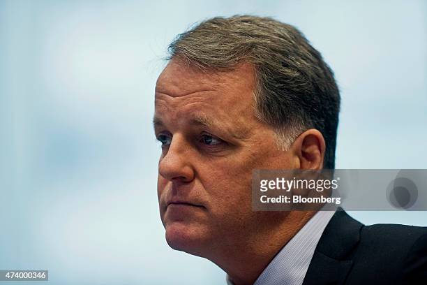 William Douglas "Doug" Parker, chairman and chief executive officer of American Airlines Group Inc., listens during an interview in New York, U.S.,...