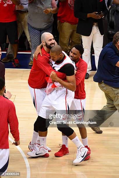 Pero Antic Al Horford and Jeff Teague of the Atlanta Hawks celebrate after the win against the Washington Wizards in Game Five of the Eastern...