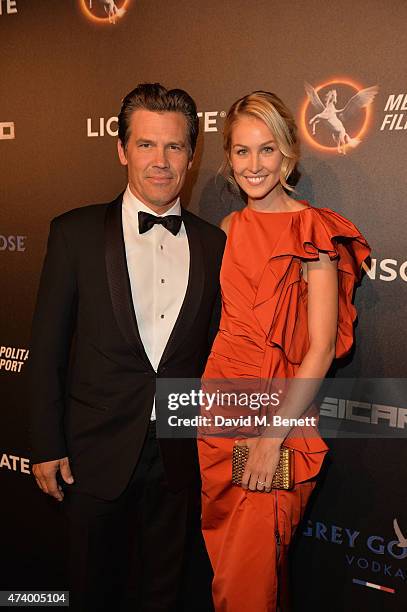 Josh Brolin and Kathryn Boyd attend The Sicario Party Hosted By Grey Goose at Baoli Beach on May 19, 2015 in Cannes, France.