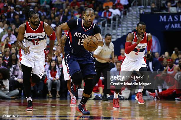 Al Horford of the Atlanta Hawks drives down court against the Washington Wizards during the second half at Verizon Center on May 15, 2015 in...