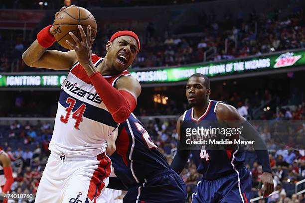 Paul Pierce of the Washington Wizards looks for a shot against Paul Millsap of the Atlanta Hawks during the first quarter at Verizon Center on May...