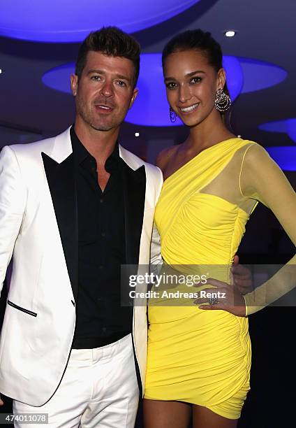 Robin Thicke and April Love Geary attend the De Grisogono party during the 68th annual Cannes Film Festival on May 19, 2015 in Cap d'Antibes, France.