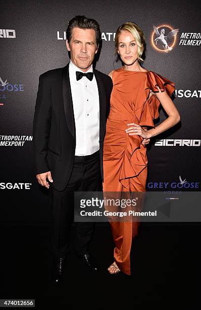 Josh Brolin and Kathryn Boyd attend The Sicario Party Hosted By Grey Goose at Baoli Beach on May 19, 2015 in Cannes, France.