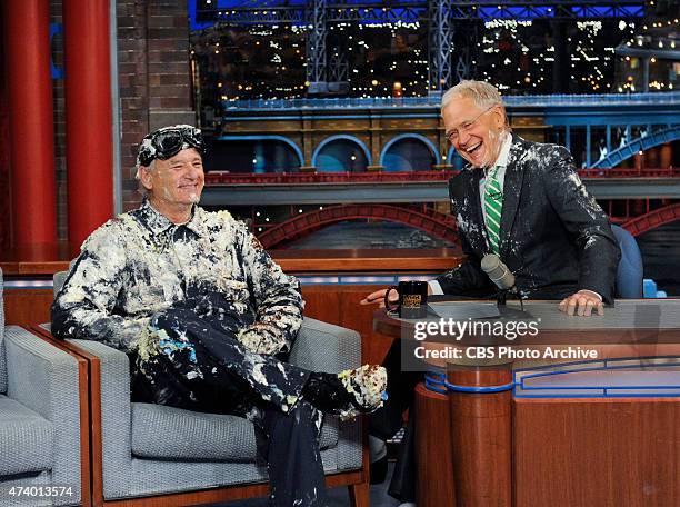 Bill Murray jumps out of giant cake, when he makes his final appearance on the Late Show with David Letterman, Tuesday May 19, 2015 on the CBS...