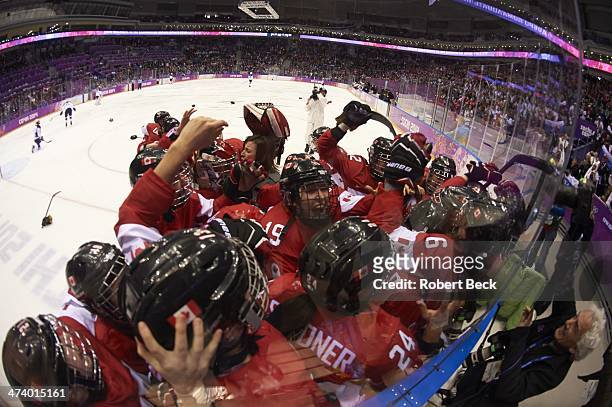 Winter Olympics: Team Canada victorious after Marie-Philip Poulin game winning goal vs USA after Women's Gold Medal Game at Bolshoy Ice Dome. Canada...