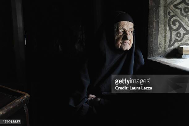 Sister Marta is seen inside an ancient Serbian Orthodox monastery during a patrolling activiy carried out by Italian KFOR soldiers after the sixth...