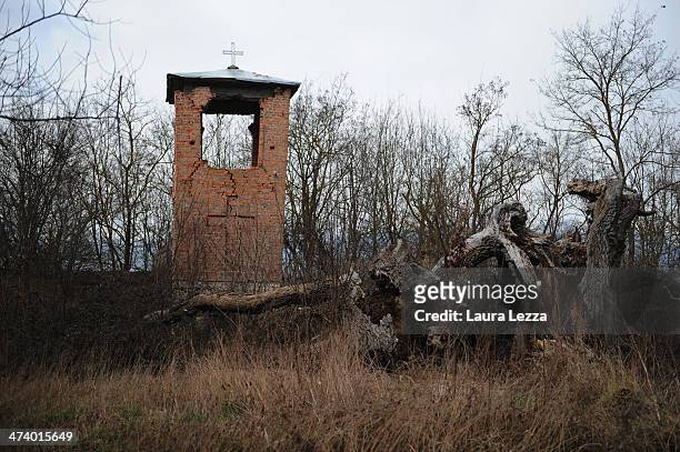 An ancient Serbian Orthodox cemetery and a church destroyed after the war by Albanians are seen during a patrolling activiy carried out by Italian...