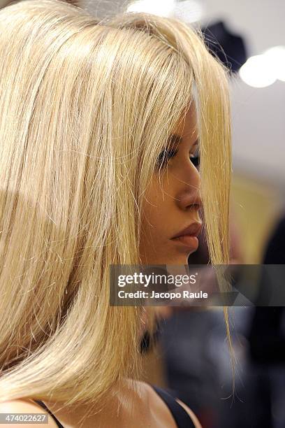 Model Georgia May Jagger prepares backstage ahead of the Versace Fashion Show during Milan Fashion Week Womenswear Autumn/Winter 2014 on February 21,...