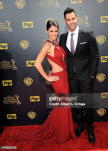 Actress Lindsay Hartley and actor Jason-Shane Scott arrive for The 42nd Annual Daytime Emmy Awards held at Warner Bros. Studios on April 26, 2015 in...