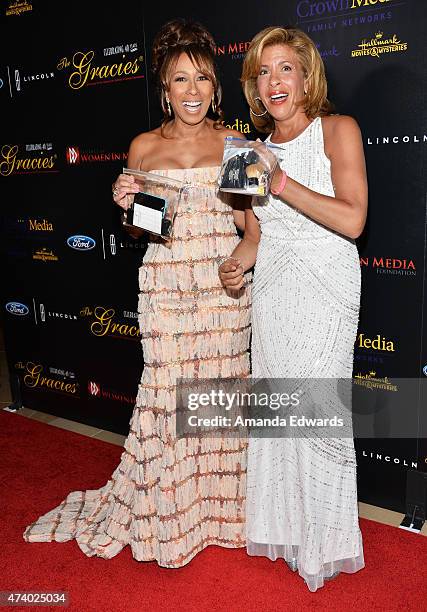 Actress Tamara Tunie and television anchorwoman Hoda Kotb arrive at the 40th Anniversary Gracies Awards at The Beverly Hilton Hotel on May 19, 2015...