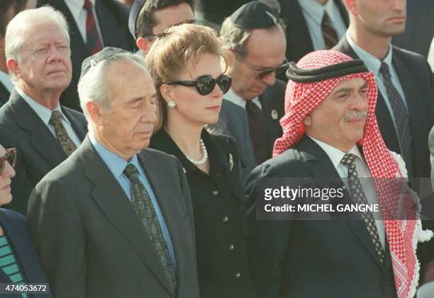 , former US President Jimmy Carter, Israeli acting Prime Minister Shimon Peres,Queen Noor and King Hussein of Jordan attend the funeral of Israeli...