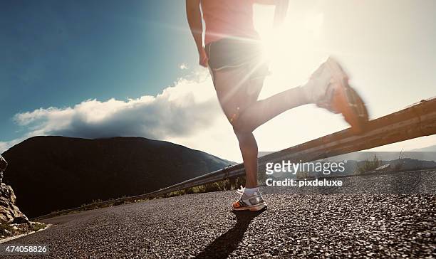 amazing legs come from an amazing workout - triathlon stockfoto's en -beelden