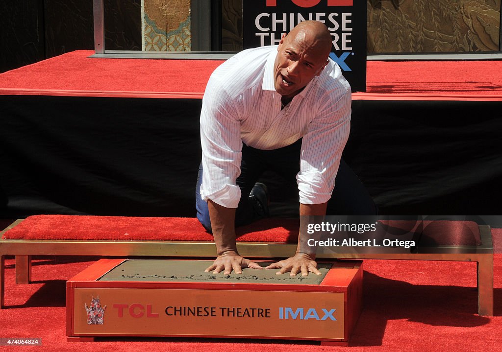 Dwayne "The Rock" Johnson Immortalized With Hand And Footprint Ceremony