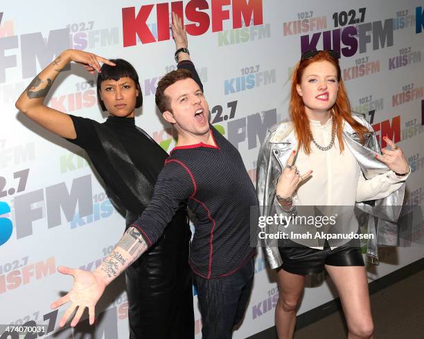 Aino Jawo and Caroline Hjelt of Icona Pop pose with radio personality JoJo Wright following a private performance at Clear Channel Media and...