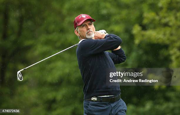 Former F1 Driver Damon Hill hits a shot during the Pro-Am ahead of the BMW PGA Championship at Wentworth on May 20, 2015 in Virginia Water, England.