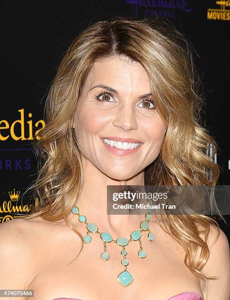 Lori Loughlin arrives at the 40th Anniversary Gracies Awards held at The Beverly Hilton Hotel on May 19, 2015 in Beverly Hills, California.