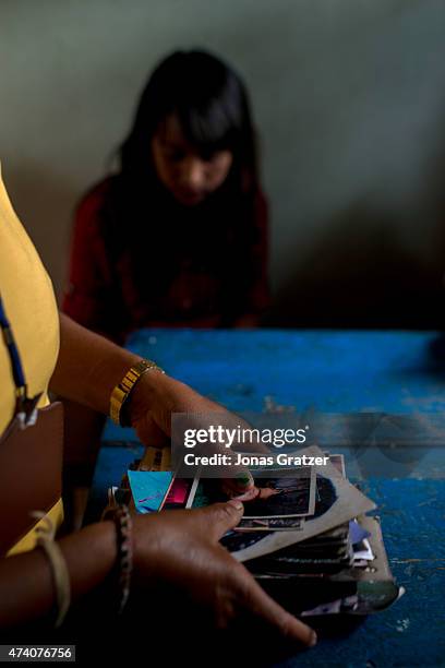 At Mati Nepal's office at the Thankot Checkpoint, staff and police interrogate a young woman who is thought to be a victim of human trafficking, on...