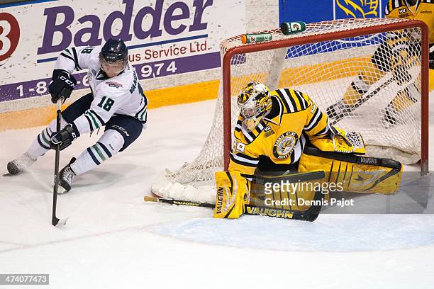 Danny Vanderwiel of the Plymouth Whalers moves the puck against