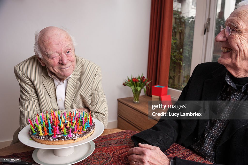 Winking after blowing out 93 birthday candles