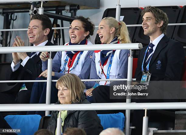 Figure skaters Jenna McCorkell, Stacey Kemp and David King of Great Britain support Team GB during the Men's Gold Medal match between Canada and...