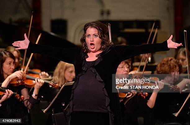 Opera singer Heather Johnson, 8 1/2 month pregnant, sings "Habanera" from "Carmen" by Bizet during the New York City Opera's "70 Years of The Peoples...