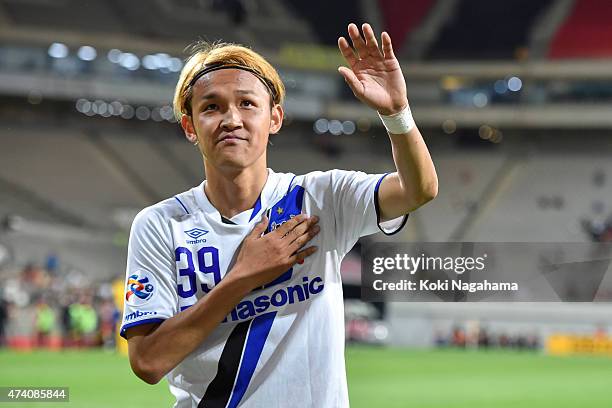 Takashi Usami of Gamba Osaka celebrates with supporters the victory after the AFC Champions League Round of 16 match between FC Seoul and Gamba Osaka...