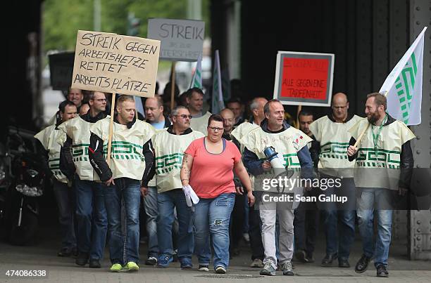 Striking members of the GDL train engineers' labor union walk outside Ostbahnhof railway station during the first full day of a railway strike by the...