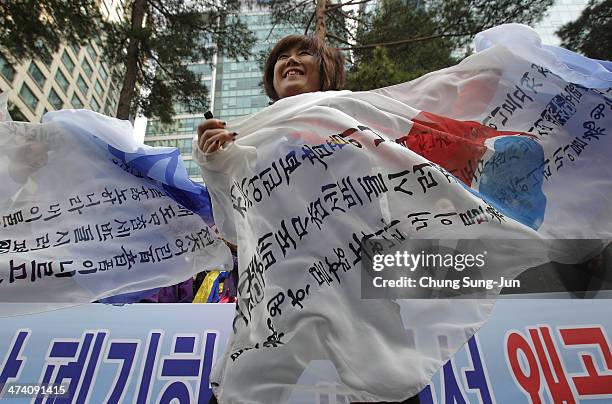 South Korean woman during an anti-Japan rally in front of the Japanese embassy on February 22, 2014 in Seoul, South Korea. Both South Korea and Japan...