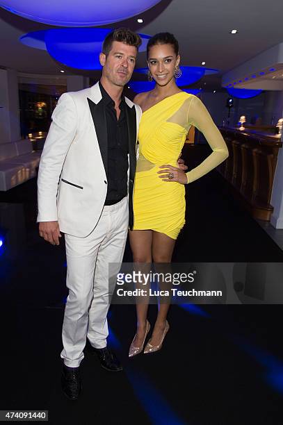 Love Geary and Robin Thicke attend the De Grisogono Party at the 67th Annual Cannes Film Festival on May May 19, 2015 in Cap d'Antibes, France.