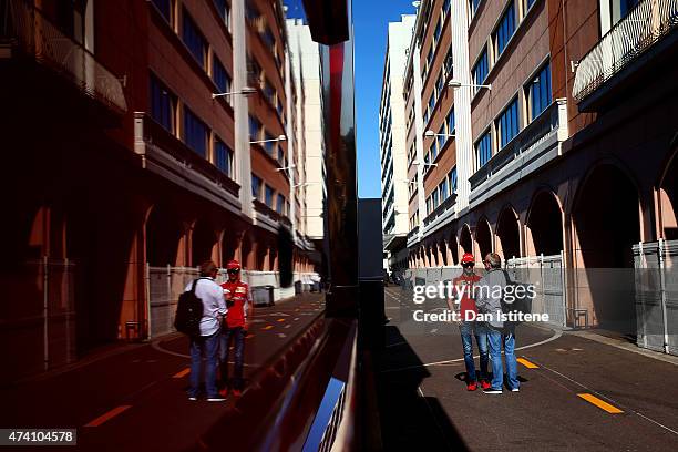 Esteban Gutierrez of Mexico and Ferrari speaks with a member of the media in the paddock during previews to the Monaco Formula One Grand Prix at...