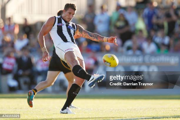 Jesse White of Collingwood kicks for goal during the NAB challenge match between the Collingwood Magpies and the Richmond Tigers on February 22, 2014...