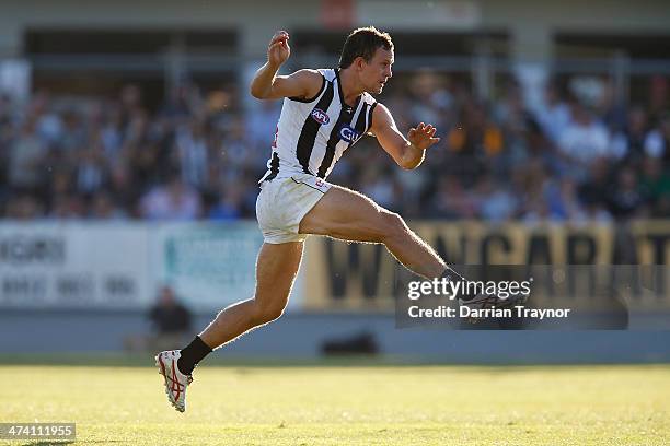 Luke Ball of Collingwood kicks the ball during the NAB challenge match between the Collingwood Magpies and the Richmond Tigers on February 22, 2014...