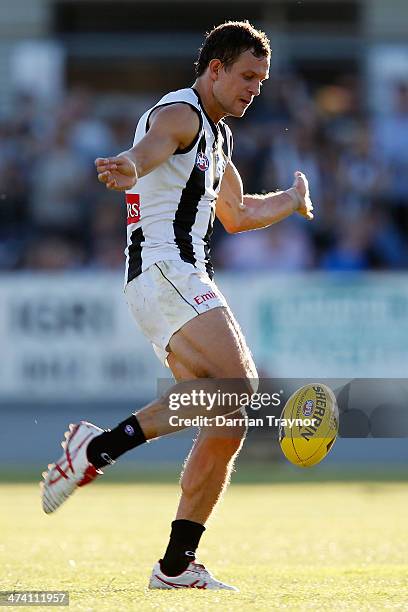 Luke Ball of Collingwood kicks the ball during the NAB challenge match between the Collingwood Magpies and the Richmond Tigers on February 22, 2014...