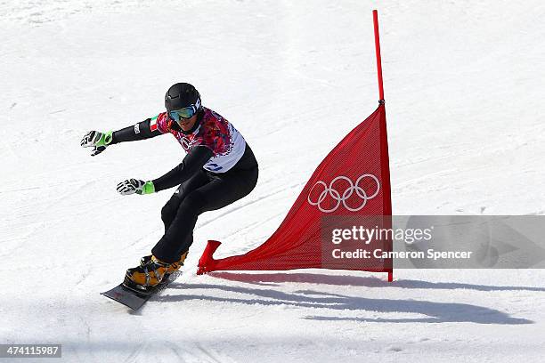 Roland Fischnaller of Italy competes in the Snowboard Men's Parallel Slalom 1/8 Finals on day 15 of the 2014 Winter Olympics at Rosa Khutor Extreme...