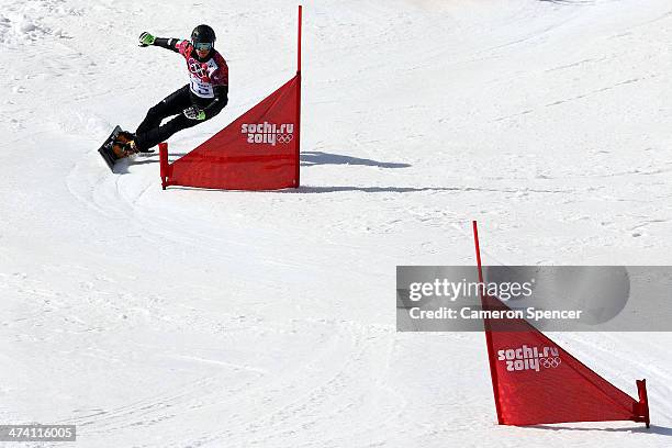 Roland Fischnaller of Italy competes in the Snowboard Men's Parallel Slalom 1/8 Finals on day 15 of the 2014 Winter Olympics at Rosa Khutor Extreme...