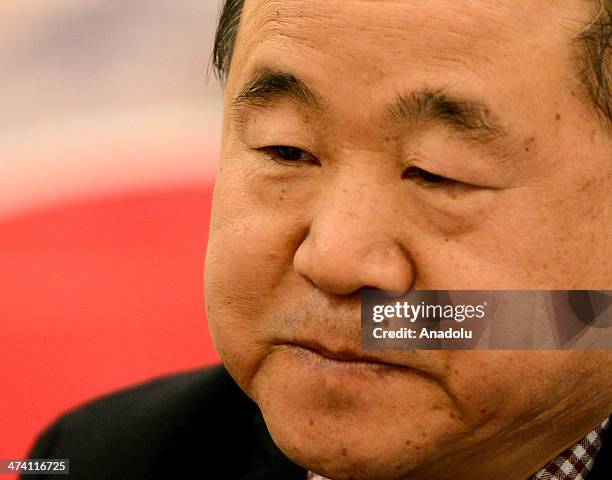 ISTANBUL, TURKEY - FEBRUARY 22: Chinese novelist and winner of the 2012 Nobel Prize in Literature Mo Yan (C) holds a press conference at Shangri La Bosphorus Hotel in Istanbul, Turkey on February 22, 2014. (Photo by Berk Ozkan/Anadolu Agency/Getty Images) istanbul turkey chinese novelist winner nobel