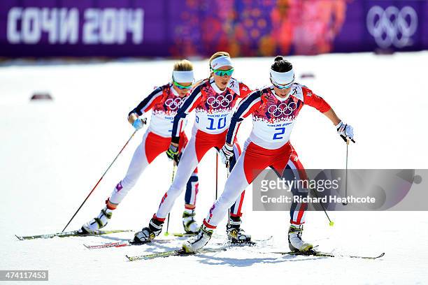Therese Johaug of Norway, Kristin Stoermer Steira of Norway and Marit Bjoergen of Norway compete during the Women's 30 km Mass Start Free during day...