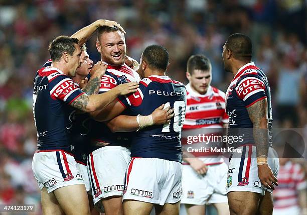Jared Waerea-Hargreaves of the Roosters celebrates with team mates after scoring a try during the NRL World Club Challenge match between the Sydney...