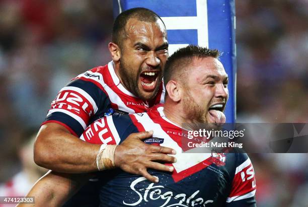 Jared Waerea-Hargreaves of the Roosters celebrates with Sam Moa after scoring a try during the NRL World Club Challenge match between the Sydney...