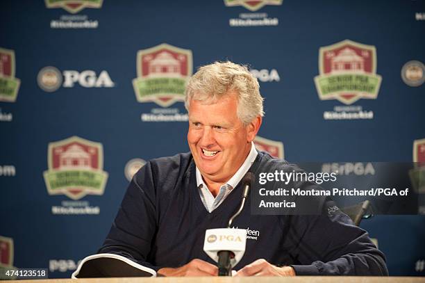 Colin Montgomerie of Scotland answers questions at a press conference during the practice rounds for the 76th Senior PGA Championship presented by...
