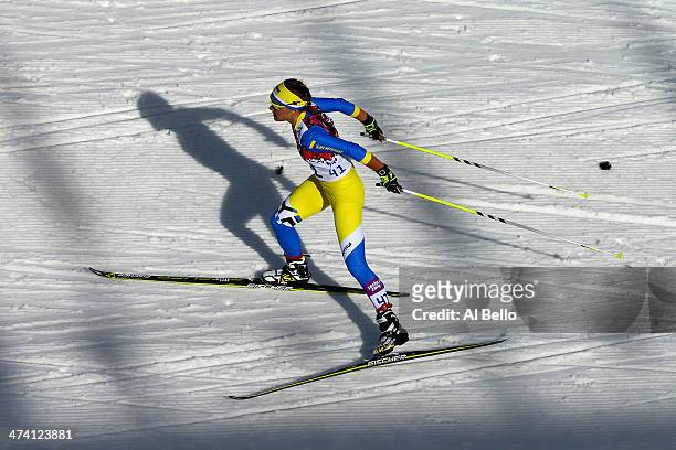 Maryna Antsybor of Ukraine competes during the Women's 30 km Mass Start Free during day 15 of the Sochi 2014 Winter Olympics at Laura Cross-country...