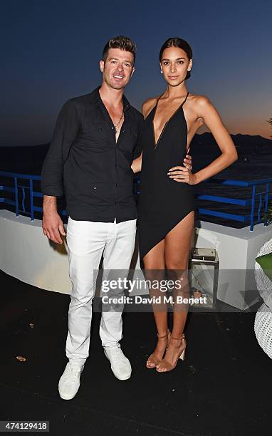 Robin Thicke and April Love Geary attend the Chopard - Annabel's in Cannes party at the Martinez Hotel on May 20, 2015 in Cannes, France.