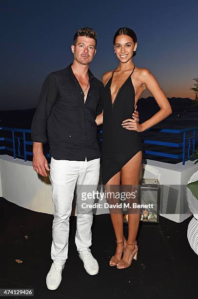 Robin Thicke and April Love Geary attend the Chopard - Annabel's in Cannes party at the Martinez Hotel on May 20, 2015 in Cannes, France.