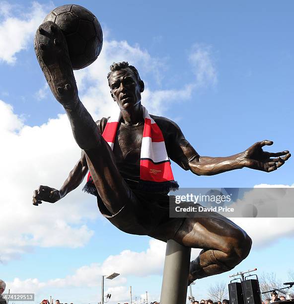 The Dennis Bergkamp statue is unveiled outside the stadium before the match between Arsenal and Sunderland in the Barclays Premier League at Emirates...