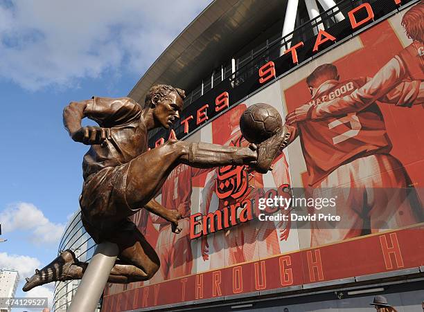 The Dennis Bergkamp statue is unveiled outside the stadium before the match between Arsenal and Sunderland in the Barclays Premier League at Emirates...