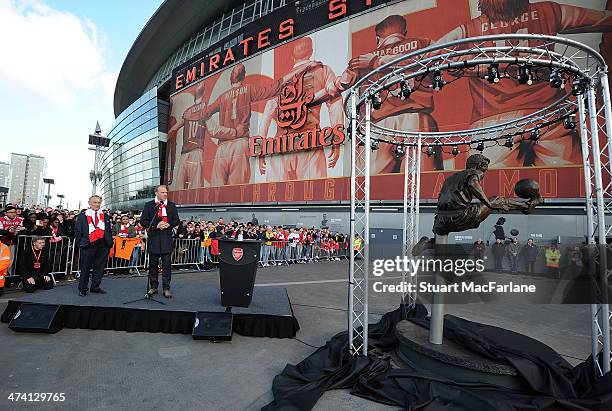 Arsenal director Ken Friar with Dennis Bergkamp at the unveiling of a statue in his honour before the Barclays Premier League match between Arsenal...