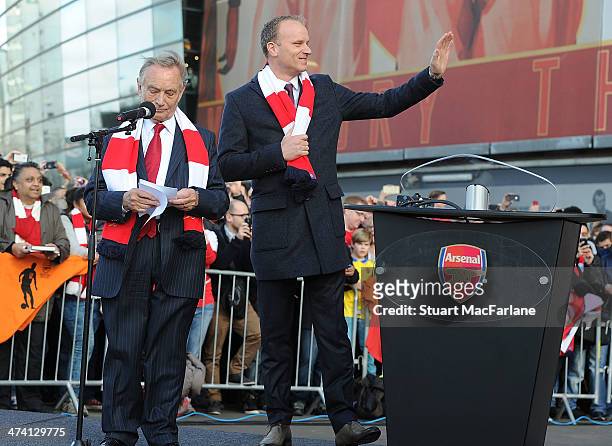 Arsenal director Ken Friar with Dennis Bergkamp at the unveiling of a statue in his honour before the Barclays Premier League match between Arsenal...